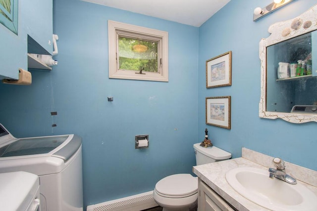 24 Indigo Ln, Osterville, MA 02655 - bathroom with independent washer and dryer, a baseboard heating unit, and vanity