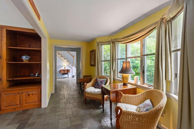 24 Indigo Ln, Osterville, MA 02655 - sitting room with stone tile floors and stairway