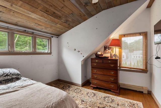 24 Indigo Ln, Osterville, MA 02655 - bedroom with vaulted ceiling, baseboard heating, hardwood / wood-style floors, and wooden ceiling
