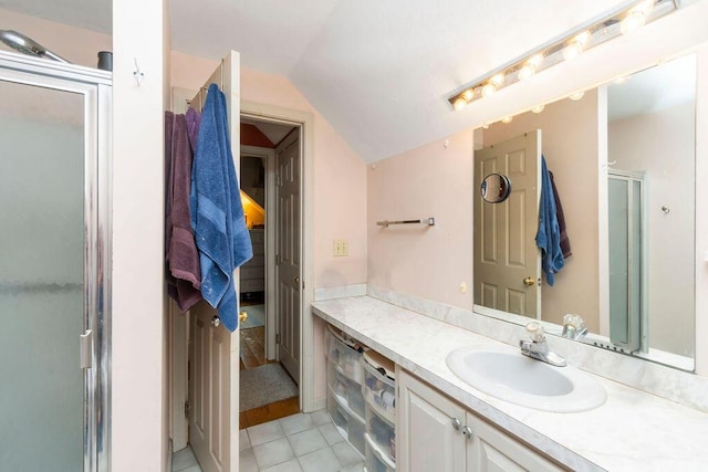 24 Indigo Ln, Osterville, MA 02655 - full bathroom featuring lofted ceiling, vanity, a stall shower, and tile patterned floors