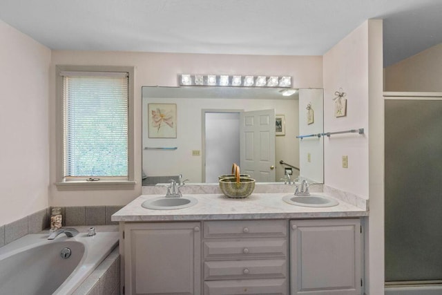 24 Indigo Ln, Osterville, MA 02655 - bathroom featuring double vanity, a stall shower, and a bath