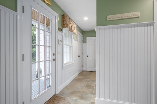 entryway featuring light tile patterned floors and recessed lighting