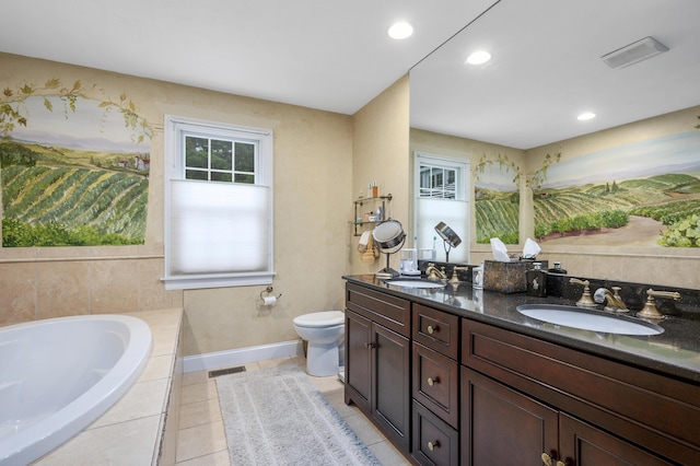 bathroom with tile patterned floors, a bath, visible vents, and a sink