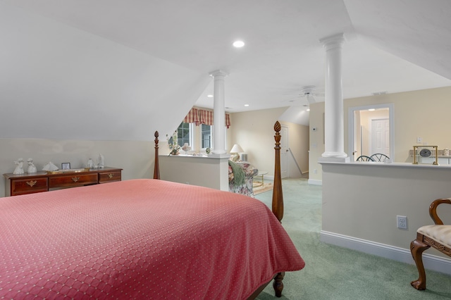 carpeted bedroom featuring recessed lighting, baseboards, lofted ceiling, and ornate columns