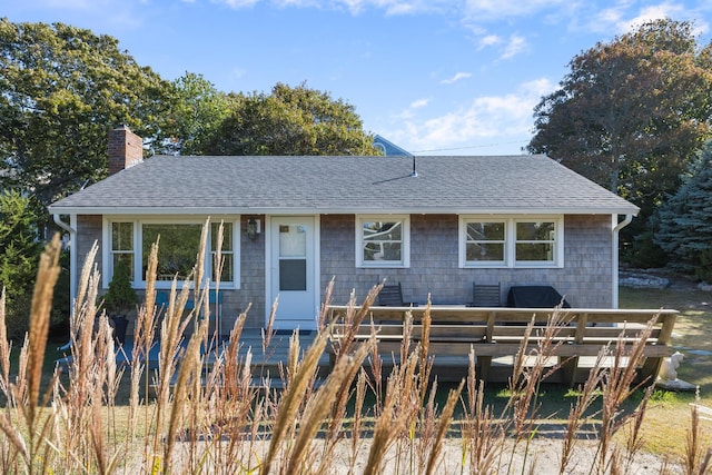 ranch-style home featuring a deck