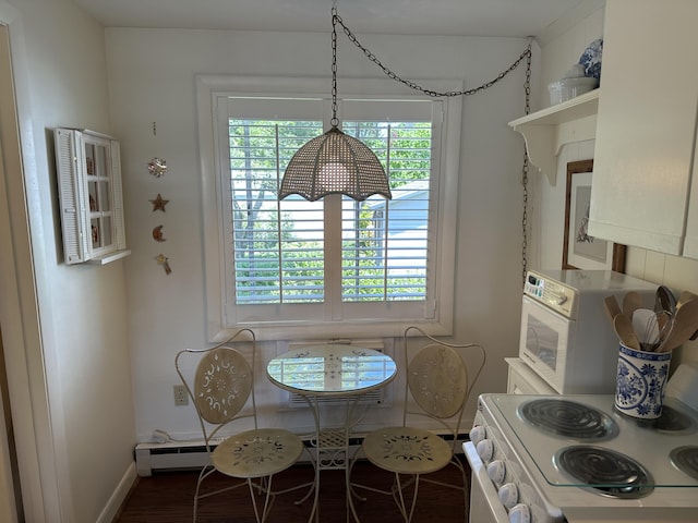91 Depot St Unit 10, Dennis Port, MA 02639 - dining space featuring baseboards and dark wood-style flooring