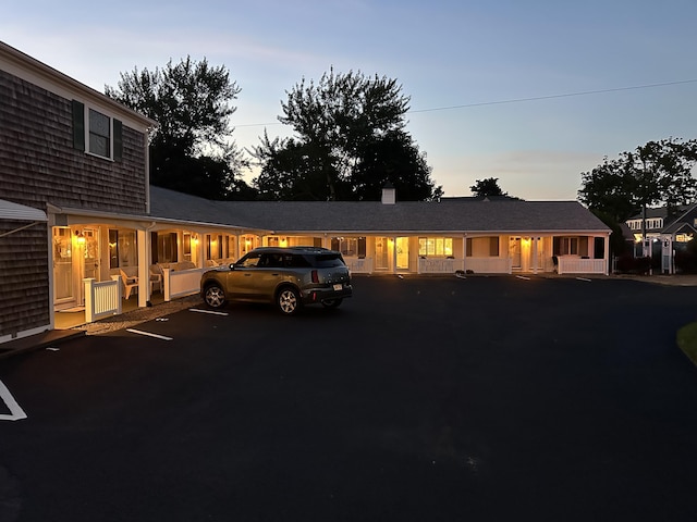 91 Depot St Unit 10, Dennis Port, MA 02639 - view of front of house with a porch and a chimney