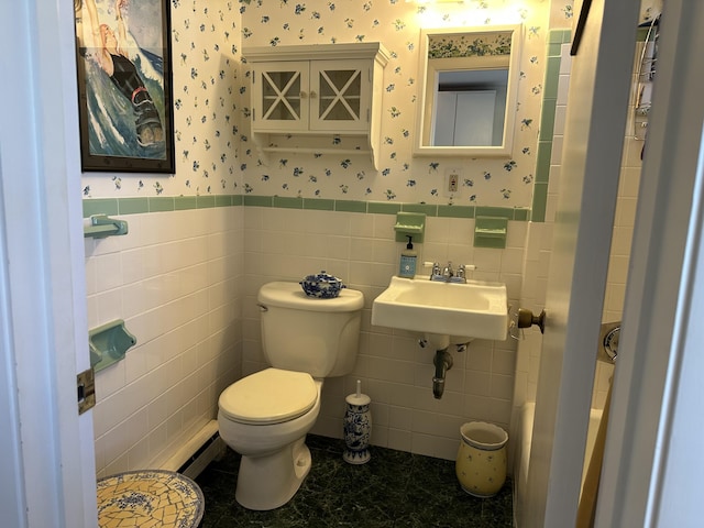 91 Depot St Unit 10, Dennis Port, MA 02639 - bathroom featuring wallpapered walls, tile walls, and a wainscoted wall