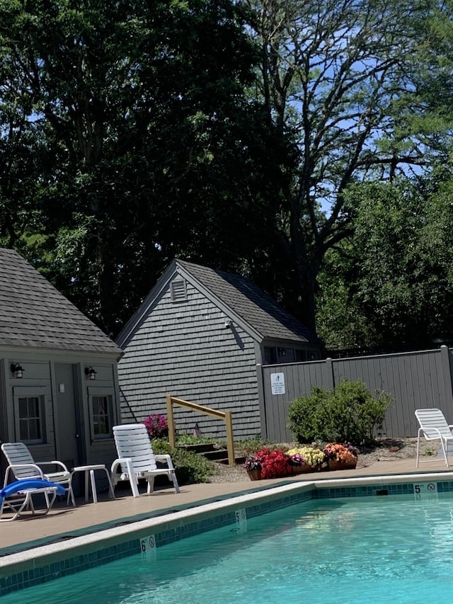 view of swimming pool featuring a patio area