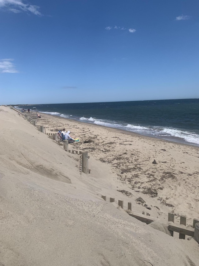 property view of water featuring a view of the beach