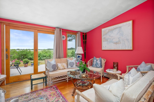 16 Gulls Cove Rd, West Yarmouth, MA 02673 - living room with lofted ceiling and wood finished floors