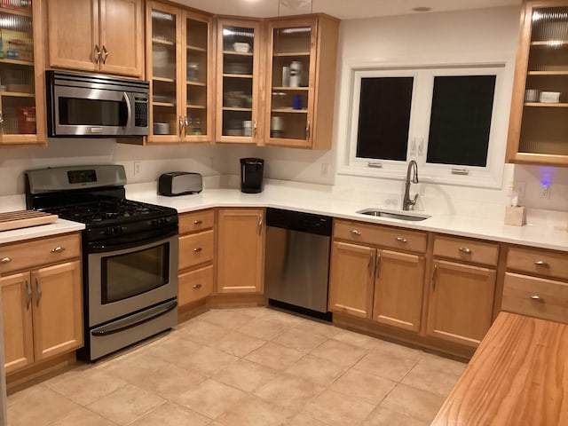 kitchen with sink and stainless steel appliances