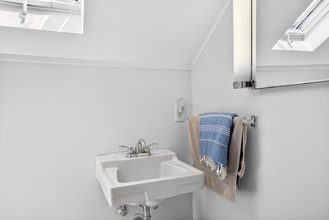 7 Anthony St, Provincetown, MA 02657 - bathroom featuring a sink and vaulted ceiling