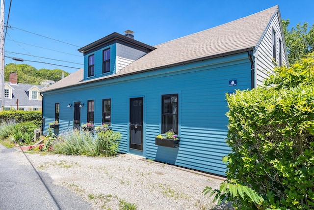 7 Anthony St, Provincetown, MA 02657 - bungalow with a shingled roof and a chimney