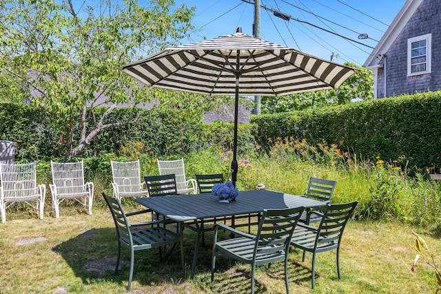 7 Anthony St, Provincetown, MA 02657 - view of green lawn with outdoor dining space