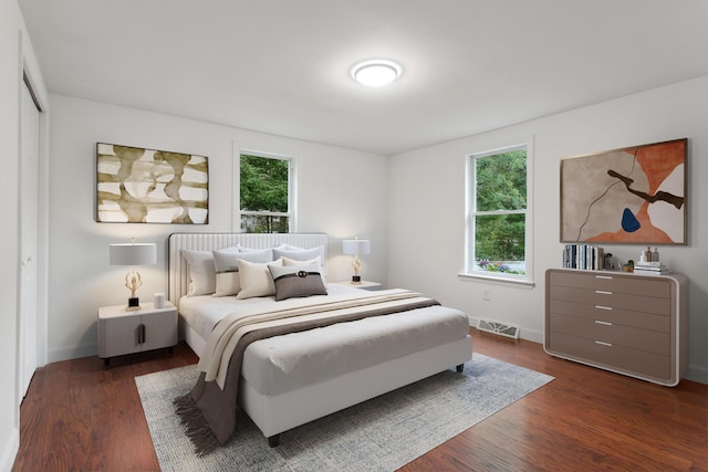 bedroom featuring dark hardwood / wood-style floors