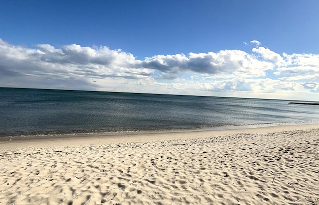 property view of water featuring a view of the beach