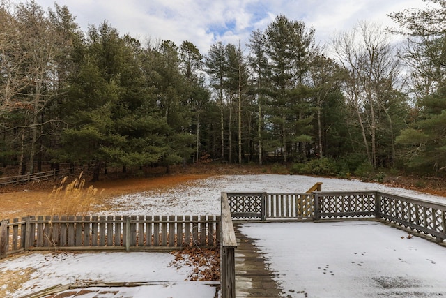 view of snow covered deck