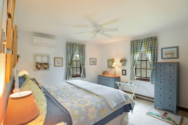 83 Colonial Way W, Falmouth, MA 02540 - carpeted bedroom featuring a wall mounted AC and a ceiling fan