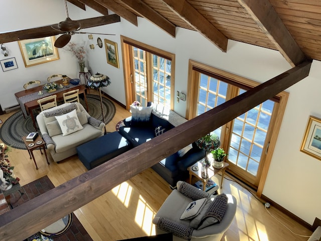 83 Colonial Way W, Falmouth, MA 02540 - living area featuring beam ceiling, wood finished floors, a ceiling fan, baseboards, and wood ceiling