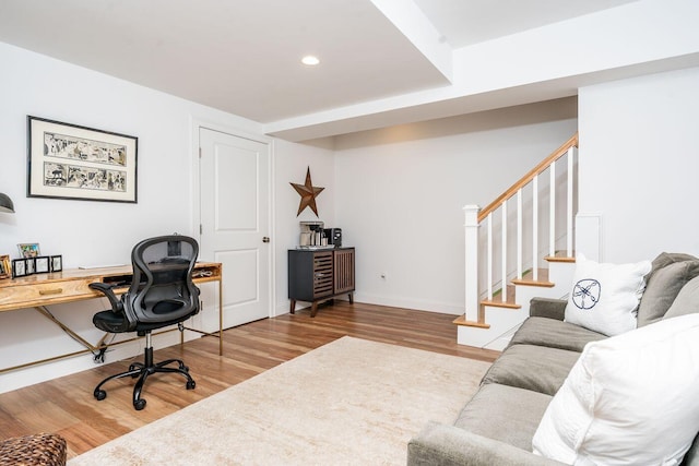 office with baseboards, wood finished floors, and recessed lighting