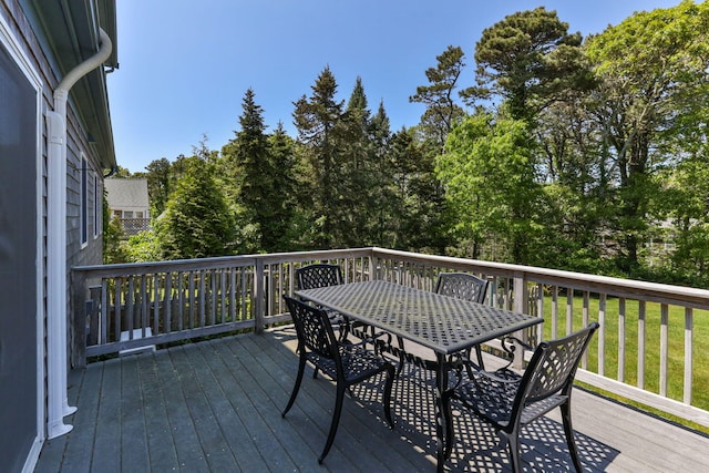 74 Deering Dr, Chatham, MA 02633 - wooden terrace featuring outdoor dining space and view of scattered trees
