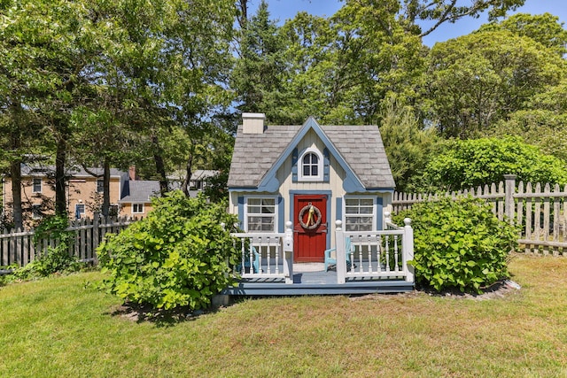 74 Deering Dr, Chatham, MA 02633 - view of front facade with an outbuilding and a shingled roof