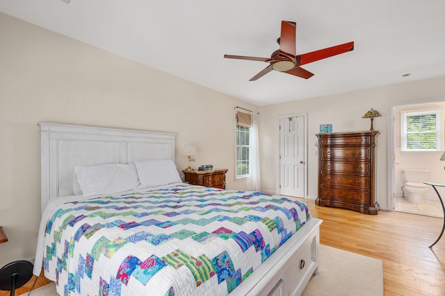 2 Julie Ln, Cotuit, MA 02635 - bedroom featuring light wood-style floors, a ceiling fan, ensuite bathroom, and a closet