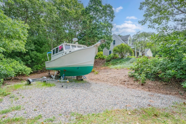 2 Julie Ln, Cotuit, MA 02635 - back of house featuring view of wooded area