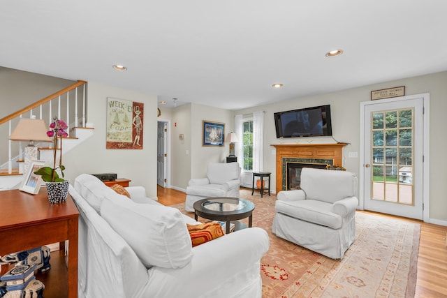 2 Julie Ln, Cotuit, MA 02635 - living room with stairway, a high end fireplace, wood finished floors, and recessed lighting
