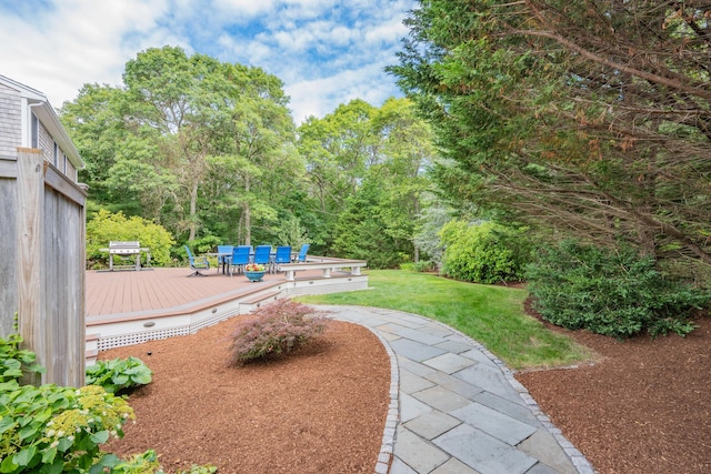 2 Julie Ln, Cotuit, MA 02635 - view of grassy yard with a deck and outdoor dining space