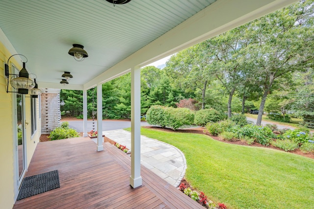 2 Julie Ln, Cotuit, MA 02635 - wooden deck featuring a ceiling fan and a lawn