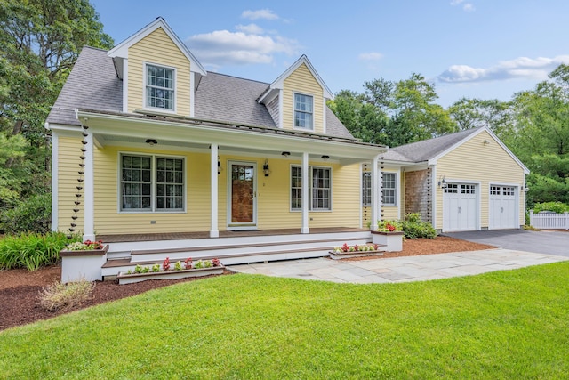 2 Julie Ln, Cotuit, MA 02635 - cape cod home featuring a porch, a front lawn, driveway, and roof with shingles