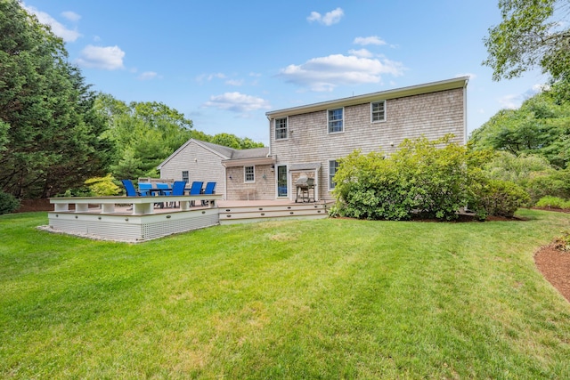 2 Julie Ln, Cotuit, MA 02635 - back of house featuring a yard and a deck