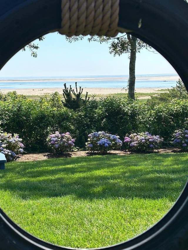 30 Tisquantum Rd, Chatham, MA 02633 - view of grassy yard with view of water and beach