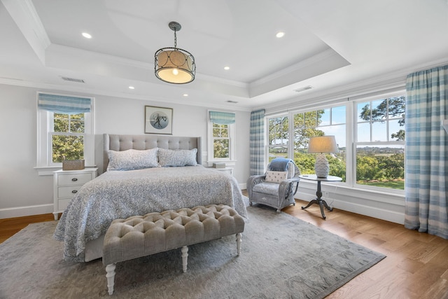 30 Tisquantum Rd, Chatham, MA 02633 - bedroom featuring a raised ceiling, multiple windows, wood finished floors, crown molding, and recessed lighting