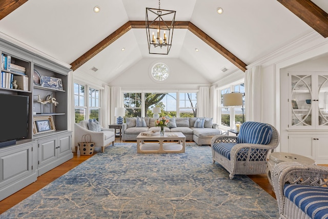 30 Tisquantum Rd, Chatham, MA 02633 - living area with a chandelier, beamed ceiling, wood finished floors, and high vaulted ceiling