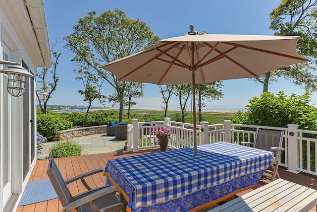 30 Tisquantum Rd, Chatham, MA 02633 - deck with outdoor dining area and a patio