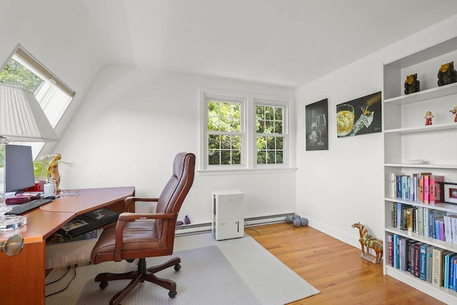 45 Green Pond Rd, East Falmouth, MA 02536 - home office with wood finished floors, plenty of natural light, and a baseboard heating unit