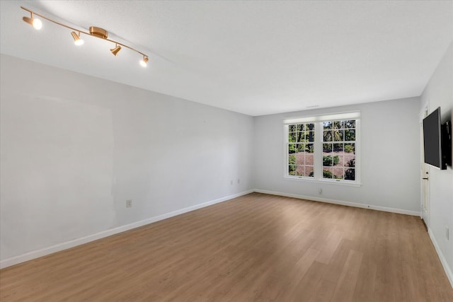 2124 Heatherwood, Yarmouth Port, MA 02675 - unfurnished room with wood finished floors and baseboards