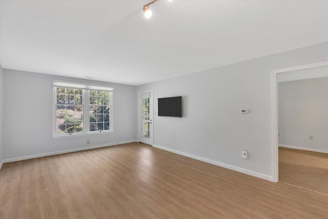 2124 Heatherwood, Yarmouth Port, MA 02675 - unfurnished room featuring light wood-style flooring and baseboards