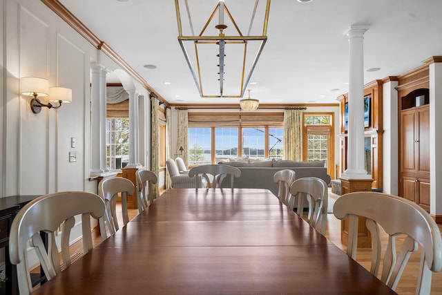 38 Captain Baker Rd, Brewster, MA 02631 - dining area featuring ornate columns and ornamental molding