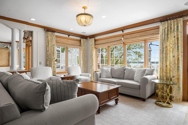 38 Captain Baker Rd, Brewster, MA 02631 - living area featuring decorative columns, ornamental molding, and recessed lighting
