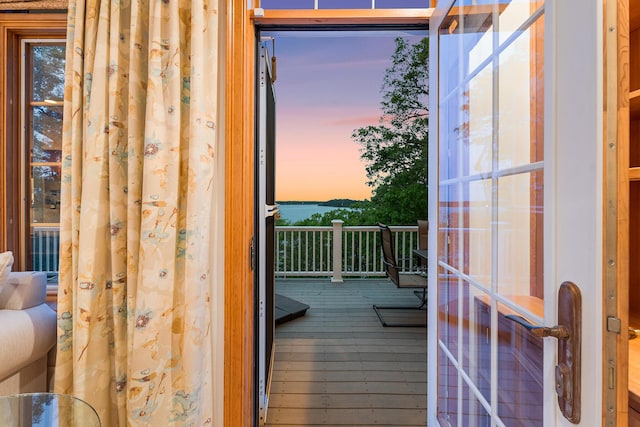 38 Captain Baker Rd, Brewster, MA 02631 - doorway to outside featuring hardwood / wood-style flooring