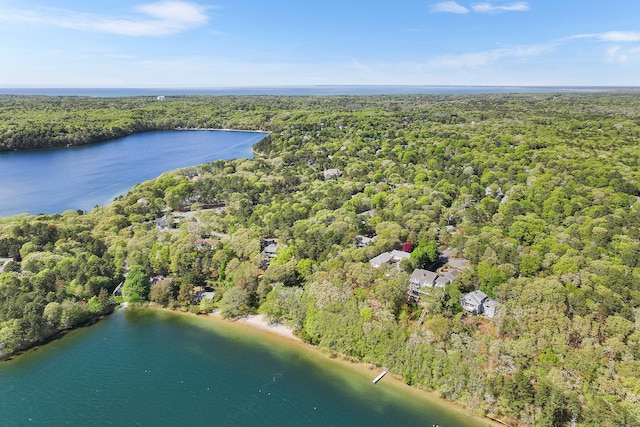 38 Captain Baker Rd, Brewster, MA 02631 - aerial overview of property's location featuring a heavily wooded area and a large body of water