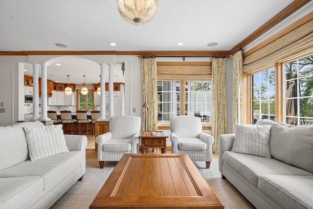 38 Captain Baker Rd, Brewster, MA 02631 - living area featuring decorative columns, ornamental molding, recessed lighting, and light floors