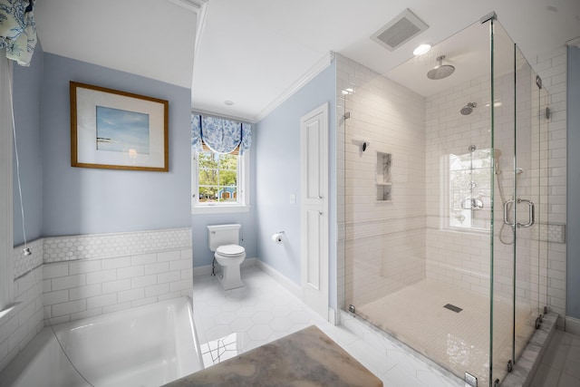 38 Captain Baker Rd, Brewster, MA 02631 - full bathroom featuring a stall shower, a garden tub, tile patterned floors, toilet, and ornamental molding