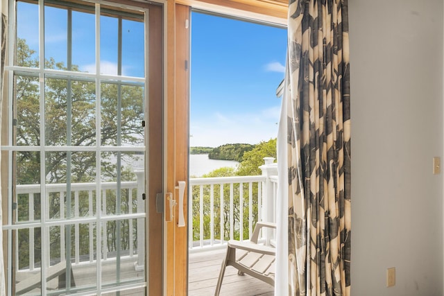38 Captain Baker Rd, Brewster, MA 02631 - doorway to outside with a water view