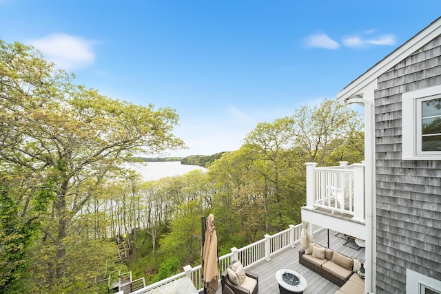38 Captain Baker Rd, Brewster, MA 02631 - balcony featuring a water view and outdoor lounge area