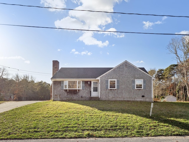 view of front facade with a front lawn